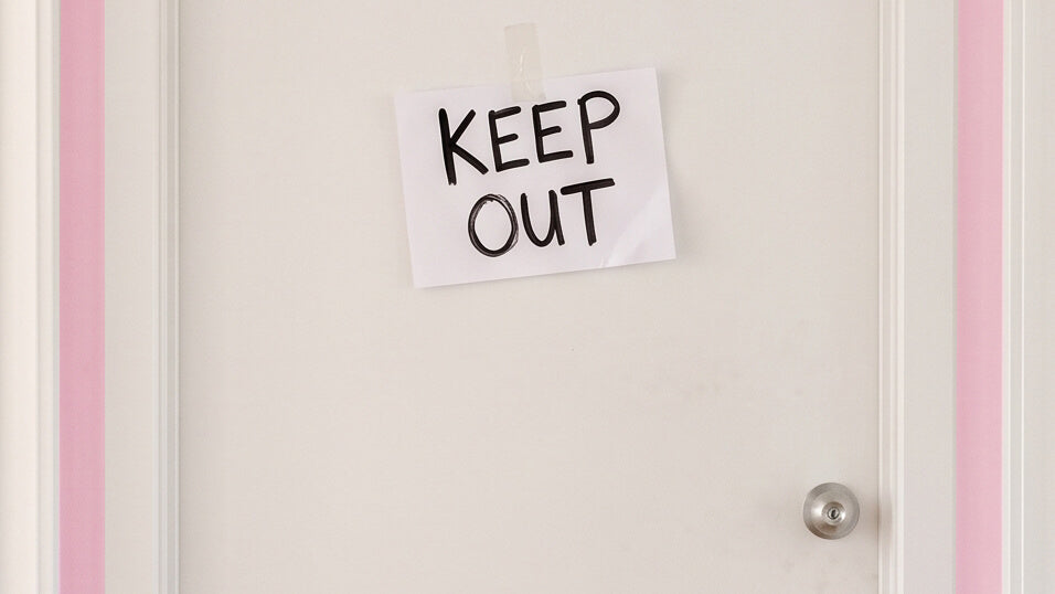 Close door with keep out sign